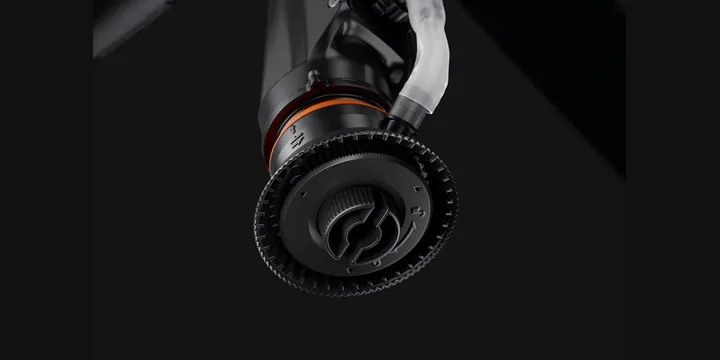 A centrifugal atomiser on the arm of a DJI Agras spraying drone