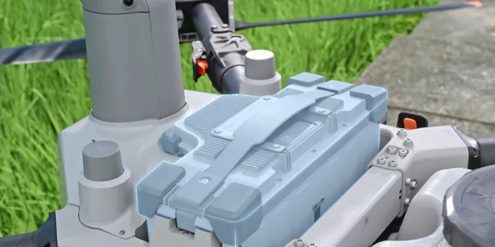 Close-up of the battery bay on a DJI Agras spraying drone