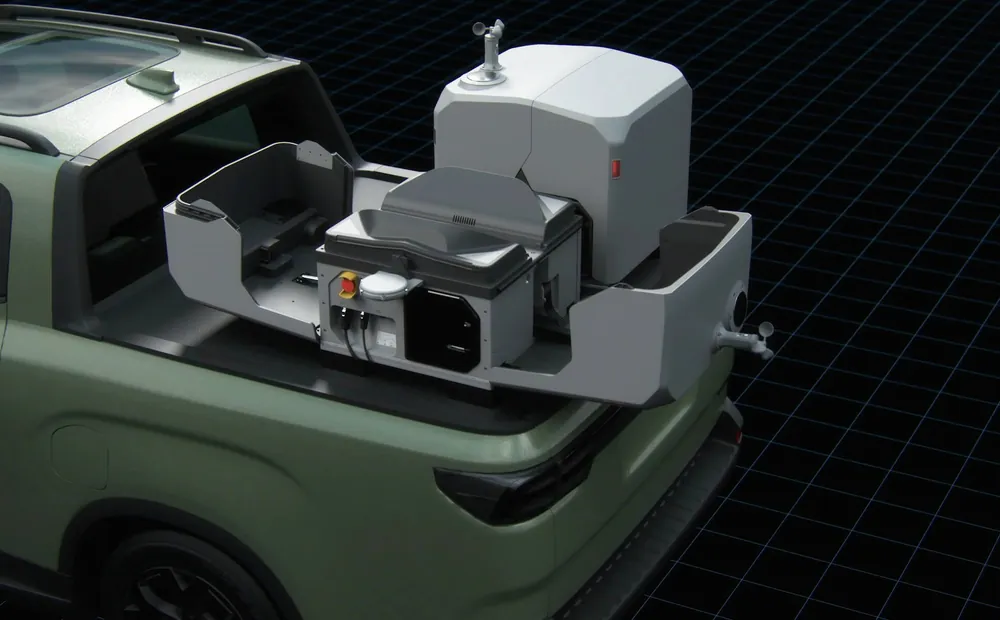 A DJI Dock 3 mounted in the load bay of a pickup