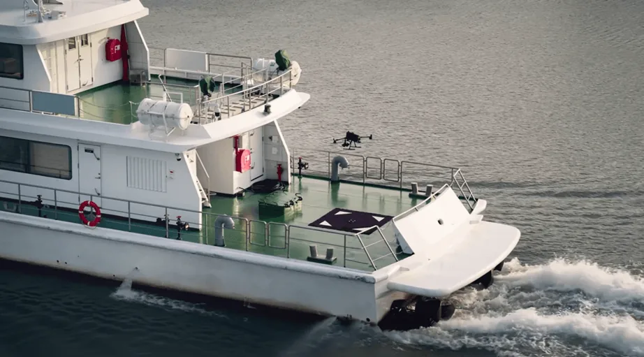 DJI Matrice 400 launching from the deck of a patrol vessel