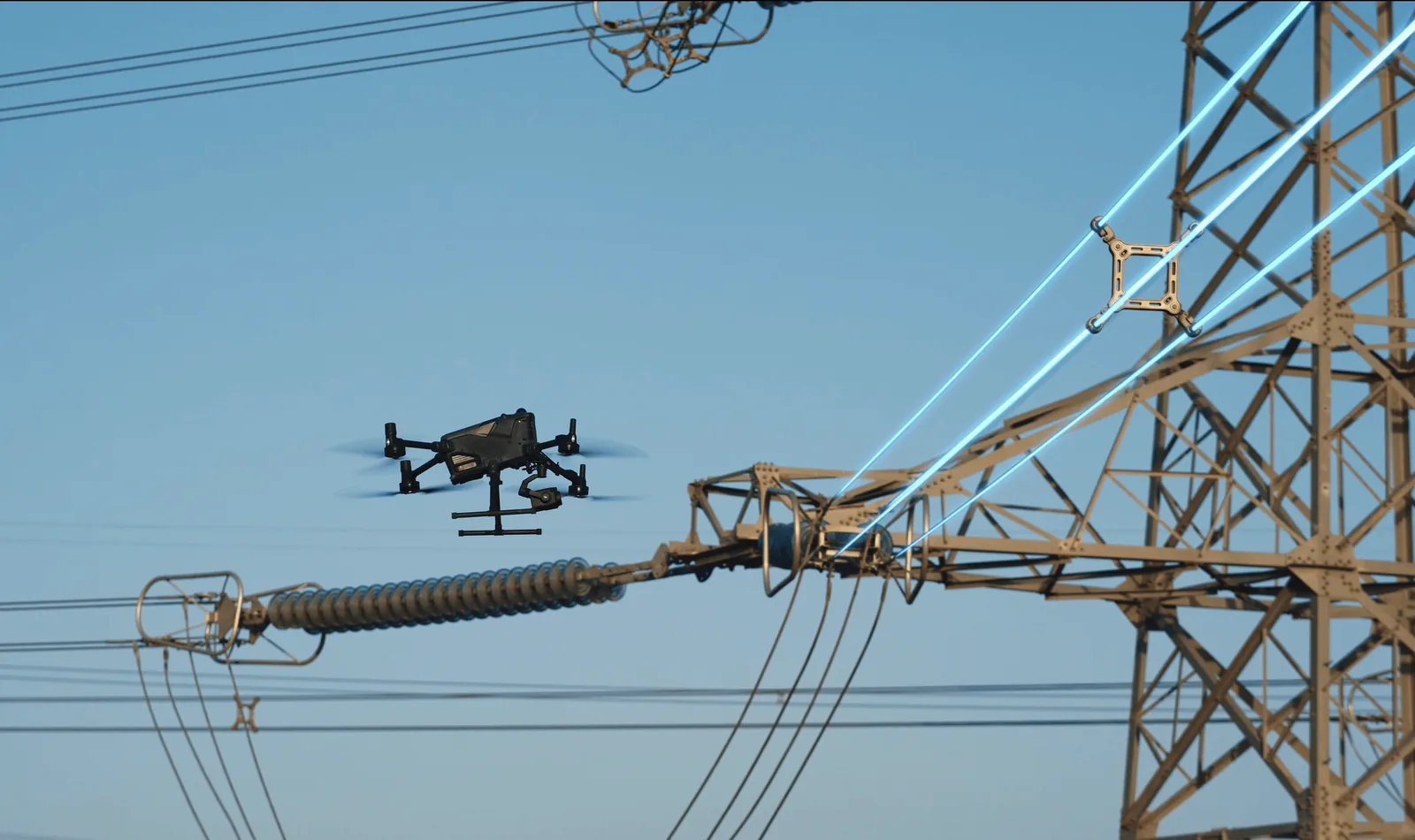 DJI Matrice 400 inspecting a high-voltage transmission tower