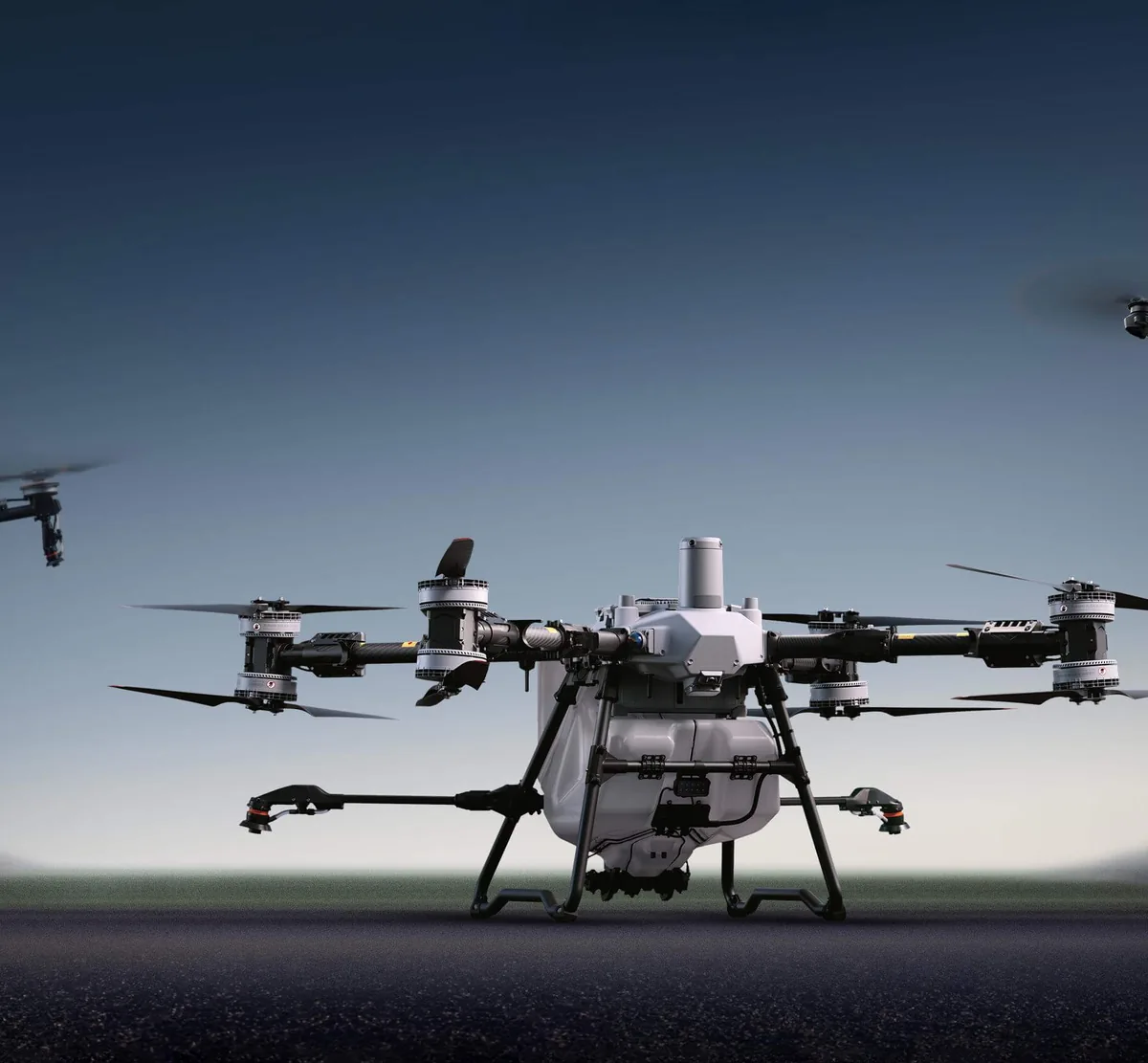 DJI Agras T100 on the ground at dusk